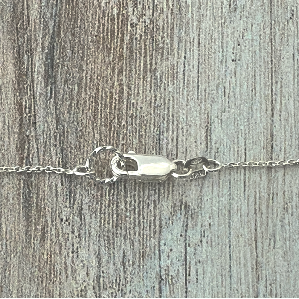 Detail of the sterling silver lobster clasp closure.
