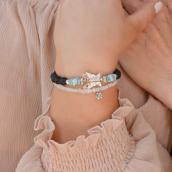 Butterfly Bliss Larimar Bracelet worn with the Moonstone and Flower Charm Bracelet