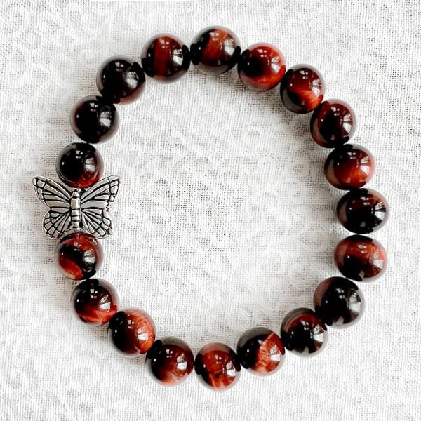 Butterfly Dreams Red Tigereye with Butterfly Charm bracelet. Deep rust red beads with whimsical butterfly charm.