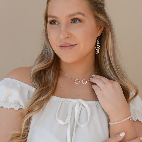 Jessica looks stunning wearing the Trinity Reflections necklace with the Moonstone Earrings and Bracelet. 