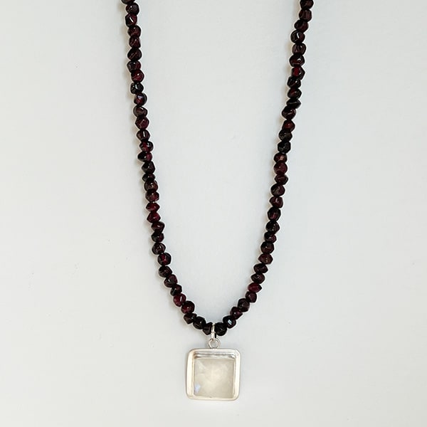 Rainbow Moonstone and rich red Garnet beaded necklace, set in sterling silver. 16 inches  Handcrafted in California Novaura Jewelry by Novaura Jewelry