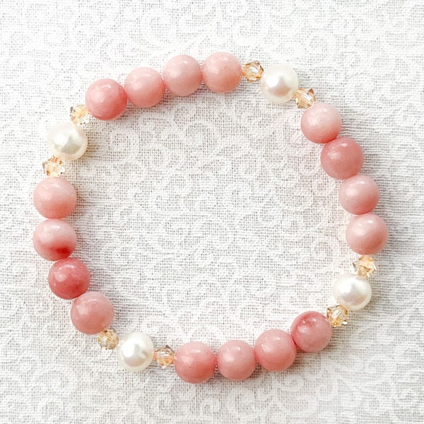 Discover your next piece to love and live in with this lovely Pink Opal and Pearl Bracelet.