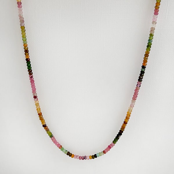 Tantalizing with Tourmaline Sparkle Choker. Look alluring at your next special occasion with this multicolored tourmaline choker with sparkling gems to catch the light. The gems are strung to match evenly from side to side for a beautifully balanced piece of wearable art.
