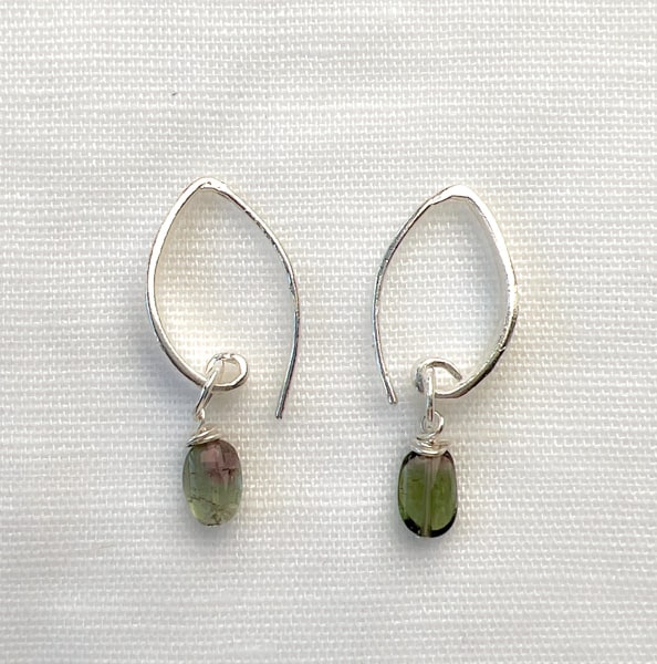 Discover the natural radiance and rainbow of colors of this tantalizing gemstone.   Effortlessly go from classic “work mode” looks to lightweight weekend layers. The translucent green & pink gems hang delicately from shimmery ear wires for a piece of wearable art. Simple and Beautiful Elegance. Ear wire side view