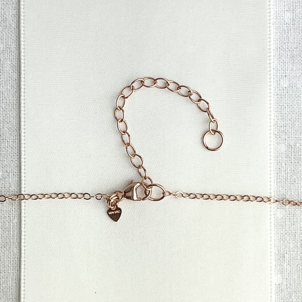 Delicate layering necklace with cultured freshwater pearl in 14kt Rose Gold Filled. Adjustable 14 to 16 in. Clasp & extension chain detail shown.