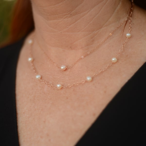 Delicate necklace with cultured freshwater pearls in 14kt Rose Gold Filled. Adjustable 16 to 18 inches, Layered with Pearl Choker - not included.