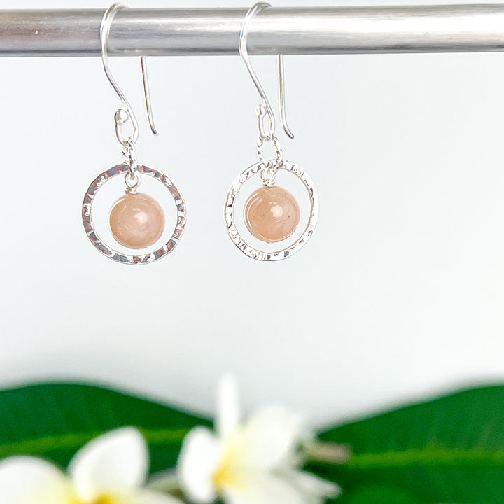 The subtle pink freckles of these Semi-precious gemstones are stunningly framed by silver circles.  Part of the Novaura Jewelry Sparkle Sets. Handcrafted in California.